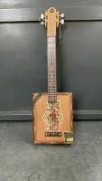 HANDMADE UKULELE WITH A CIGAR BOX BODY