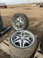 Set of four tires on Akuza rims