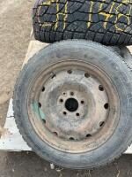 Pallet of three mixed tires