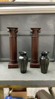 (2) LIGHT WOOD PEDESTALS & (2) BLACK METAL VASES