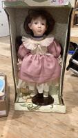 SHELF #11 - PORCELAIN DOLL + WOOD PUZZLES
