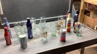 BOX OF GLASSES- COKE + PEPSI AND BOTTLES/CANS