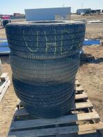 Stack of four Goodyear tires