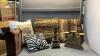 COLLECTION OF AFRICAN THEME ITEMS - THROW PILLOWS, WINE BOX, RESIN CANDLE HOLDERS