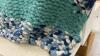 HAND KNOTTED COUCH THROW IN A BLUE RECYCLE TUB - 2