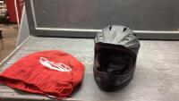 MOTORCYCLE HELMET IN RED BAG