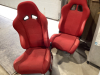 PAIR OF RED BUCKET SEATS