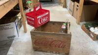 COCA-COLA CRATE W/ A FEW VINTAGE BOTTLES AND A PLASTIC BOTTLE HOLDER