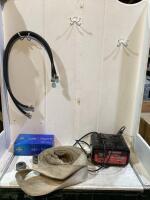 SHOP BOX W/ MOTOMASTER BATTERY CHARGER, WIRE + FLAGS, WASHING MACHINE HOSES, LIFTING SLING STRAP