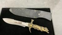 BRASS WOLF HANDLED KNIFE IN LEATHER SHEATH