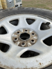 Set of four truck tires on Chevy rims - 2