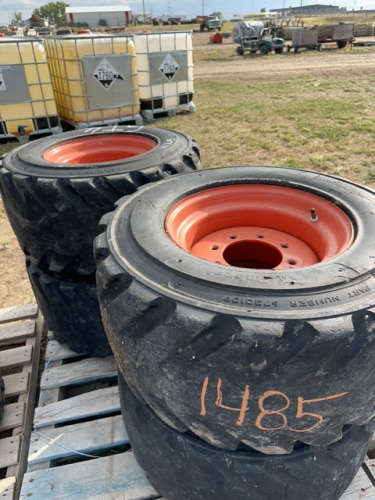 Skid steer, tires, and rims