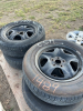 Set of four Toyota tires, and rims