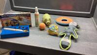 BOX OF WITH DOG TOYS, PEDICURE TOOL, PET SPRAY