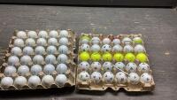 (2) FLATS OF GOLF BALLS