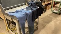 (1) PAIR OF NEW WRANGLER JEANS 42 X 32, (4) T SHIRTS XL + XXL