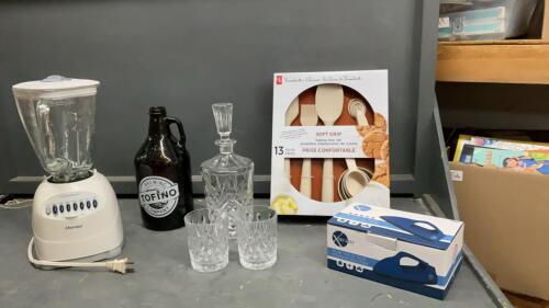 BOX OF KITCHEN ITEMS - OSTERIZER BLENDER, STEAM IRON, HIGHBALL GLASSES & DECANTER, SILICONE & PLASTIC BAKING TOOL SET