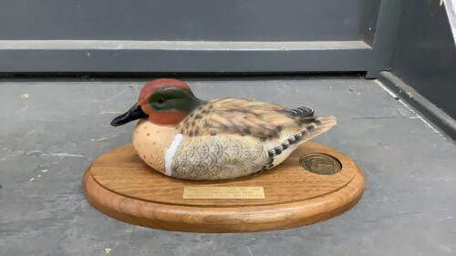 DUCKS UNLIMITED SASKATCHEWAN - SMALL DUCK ON WOOD BASE