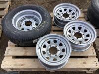 (1) 6 BOLT CARLISLE TRAILER TIRE ON RIM ( NEW ) & (3) 6 BOLT RIMS ( TRAILER )