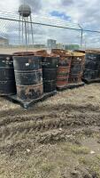 Pallet of four steel burning barrels