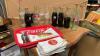 COCA-COLA COLLECTION - BOTTLES, CUPS, TRAYS, NAPKINS, IN A CHINOOK BEVERAGES 7-UP WOOD CRATE