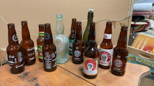 REDCLIFF BREWERY COMMERATIVE BEER BOTTLES W/ NAMES OF EMPLOYEES ON THE BOTTLES -1989, CALGARY EXPORT BEER,