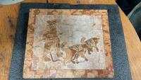INUIT CARVED ART ON A PIECE OF MARBLE/GRANITE