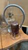 (7) PIECES. - ASSORTMENT OF OIL LAMPS, (2) BATTERY LIGHTS FROM THE 50&rsquo;S AND EXTRA CHIMNEYS - 2