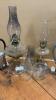 (7) PIECES. - ASSORTMENT OF OIL LAMPS, (2) BATTERY LIGHTS FROM THE 50&rsquo;S AND EXTRA CHIMNEYS - 5
