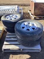 (4) BRIDGESTONE LIGHT TRUCK TIRE W/ 5 BOLT RIMS
