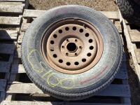 BRIDGESTONE TIRE 6 BOLT RUSTED RIMS