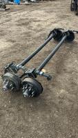 Pair of slightlused drop axles with springs