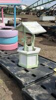 Small wooden wishing well