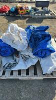 Pallet of tarps and totes