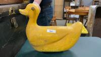 OLD YELLOW DUCK FROM A PLAYGROUND