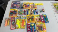 PEZ DISPENSERS W/ CANDY, RULERS,