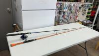 (2) FISHING RODS - ONE W/ A SOUTHBEND REEL