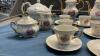 (2) SETS OF SMALL TEA CUPS & SAUCERS W/ TEAPOTS AND CREAM/SUGARS + LARGE &ldquo;MOTHER&rdquo; TEACUP/SAUCER + MUSICAL TEAPOT - 2