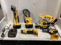 SHOP BOX OF CORDLESS DEWALT TOOLS W/ FLASH LIGHT, ANGLE GRINDER, CIRCULAR SAW, CHARGER AND CUT-TOOL