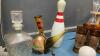 GOOD LIDDED TOTE W/ LIQUOR RELATED ITEMS - 4