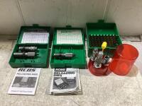 BOX OF RELOADING DIES AND BULLET CASINGS