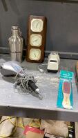 FLAT W/BAROMETER, KNIFE SHARPENER, MASSAGER, THERMOS, FOOT FILE
