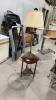 FLOOR LAMP ON A SMALL DROP LEAF SIDE TABLE