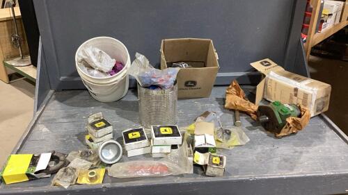 BOX OF JOHN DEERE PARTS, SWATHER KNIVES, ORBIT MOTOR, SPRAYER JETS