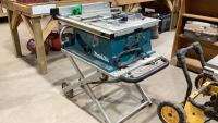 MAKITA PORTABLE TABLE SAW ON FOLDING STAND