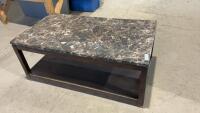 COFFEE TABLE ON CASTORS W/ A FAUX MARBLE TONE