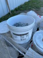 Six pails of new one and three-quarter inch barbed staples / bid per pail