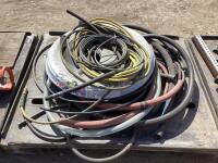 PALLET W/ ASSORTMENT OF HOSES & STEEL CABLE