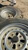4 BRIDGESTONE ATV TIRES W/ RIMS - AT25X10-12 (X2)AND AT 25X8-12 (X2) - 4