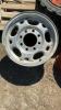 2 RIMS AND A TITAN TIRE W/ RIM - 27X8.50 - 15 - 3